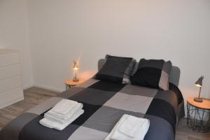 Appartements Le Faubourg : photos des chambres