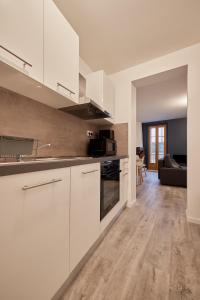 Appartements Le Faubourg : photos des chambres
