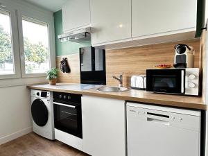 Appartements Le nid de la basilique T3 avec balneo : photos des chambres