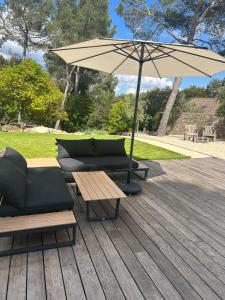 Maisons d'hotes A l-ombre des pins : photos des chambres