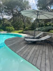 Maisons d'hotes A l-ombre des pins : photos des chambres