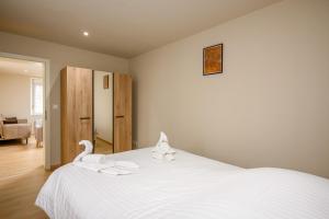 Appartements Le 60-Appart-Hotel-GregIMMO : photos des chambres