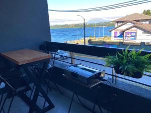 Dpto costero vista al lago, piscina y jacuzzi