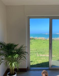 Villas Villa Les Pieds dans l-Eau : photos des chambres