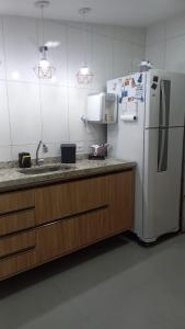 Apartamento com Suíte em Bertioga Indaiá 150 metros da Praia