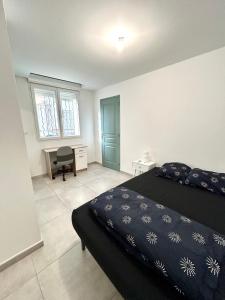 Joli RDC à 2 pas du centre ville