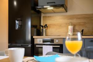 Appartements Le 63-Appart-Hotel-GregIMMO : photos des chambres