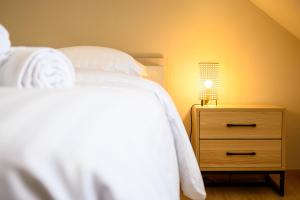 Appartements Le 63-Appart-Hotel-GregIMMO : photos des chambres