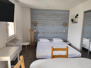 Appartements Mailh- Massibe T2 5 pers climatisation piscine couverte linge de maison inclus parking jardin clos : photos des chambres