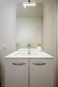 Appartements Le 09-Appart-Hotel-GregIMMO : photos des chambres