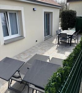 Maisons de vacances Ticya Lodge 10 minutes Parc Disneyland Maison neuve independante jusqu-a 5 voyageurs lit bebe 2 places Parking Ferme : photos des chambres