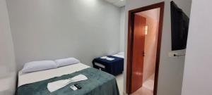Quarto suíte 8, cama casal1, cama solteiro 1