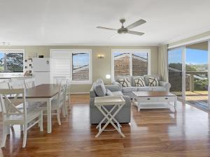 Coastal Upper-Level Home with Shared Pool Access