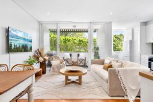 Beachside escape steps from the surf & village