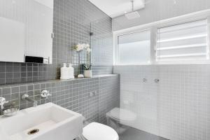 Beachside escape steps from the surf & village