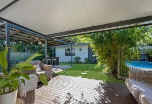 Large Family home in paradise! 1x 3 Bed house and 1x 2 Bed house only 1 Booking at any time