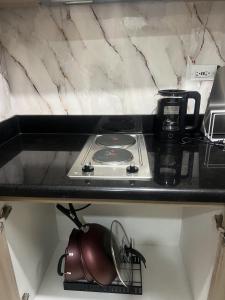 Shore 2 Residences Executive Suite by JMS