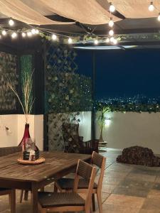 The Rooftop TerraceA unique view, downtown and comforta