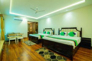 Treebo Greenland Resort, Patia