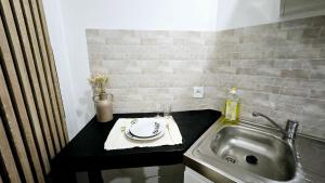 Appartements Studio Le Petit Valenciennois : photos des chambres