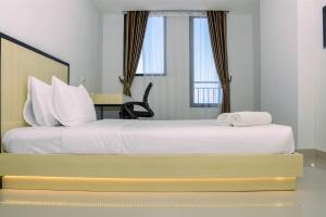 Cozy Studio with Single Bed at Evenciio Margonda Apartment By Travelio