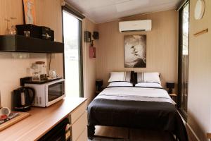 Farmhouse 2 at Coffs by Tiny Away