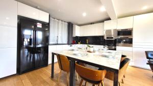 Le Bellevue - Beaux appartements avec vue splendide : photos des chambres