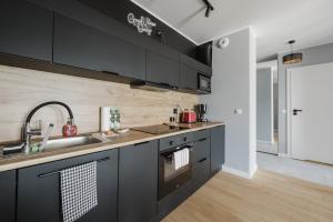 Fiqus Marcelin Deluxe Apartment by BookingHost