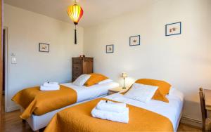 Appartements L-echappee verte pour six personnes avec terrasse, place de parking : photos des chambres
