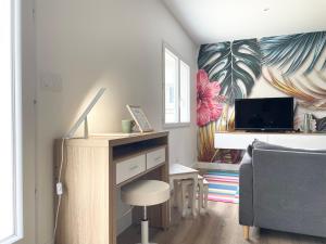Maisons de vacances Sous le Marronnier - Maison pour 4 avec jardin : photos des chambres