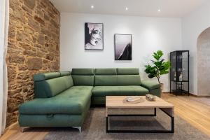 Beigestone Luxury Center by Belmont Realty