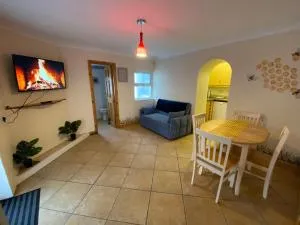 Beach Golf Getaway Apt 1 - 邓法纳希