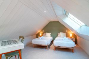 Maisons de vacances Chalet Kerinis - Maison avec jardin : photos des chambres