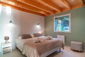 Maisons de vacances Chalet Kerinis - Maison avec jardin : photos des chambres