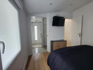 Appartements Le Loft Minimaliste : photos des chambres