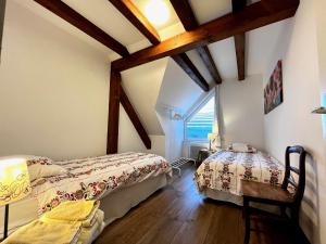 Appartements Gite Ophelia dans Domaine Viticole - Maison ZEYSSOLFF : photos des chambres