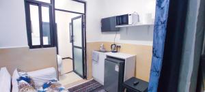 Rosëville Budget Studio -- Rooftop Pool, Gym, Office Space, Children play area