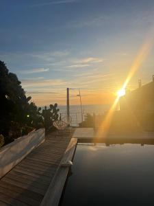 Villas Haut de villa avec piscine au bord de mer : photos des chambres