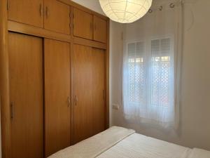 Muy bonito apartamento de dos dormitorios y dos baños con patio privado