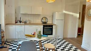 Charmant rez-de-jardin lumineux en plein centre ville de Grenoble