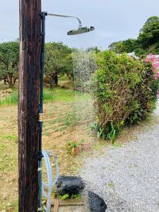 広い畳間と外には広いウッドデッキCondominium和風邸Yanbaru