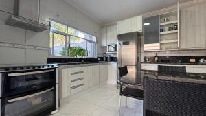 Casa 300m Praia, Ar condicionado, Área Gourmet, Piscina climatizada