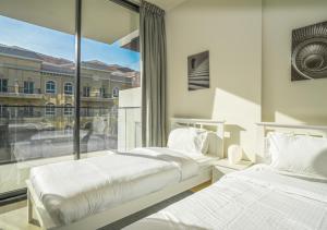 Spacious 3BR Apartment in JVC Dubai Modern & Cozy Stay