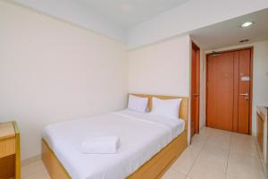 Cozy Living Studio Room at Margonda Residence 3 Apartment By Travelio