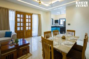 Nakeshatra Villa by VEO - Part of StayVista with Pool, Lawn, Balcony at city center in Udaipur