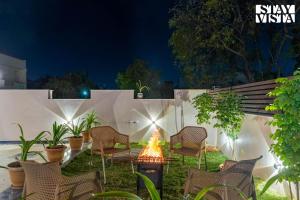 Nakeshatra Villa by VEO - Part of StayVista with Pool, Lawn, Balcony at city center in Udaipur