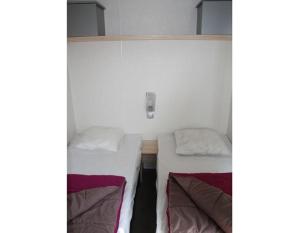 Campings BONNES VACANCES sur le CAMPING LE BOSC : photos des chambres