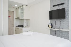 Nice and Comfort Studio at Akasa Pure Living BSD Apartment By Travelio