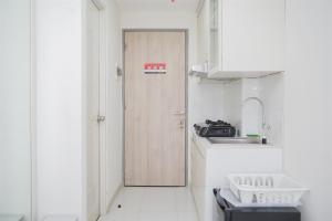 Nice and Comfort Studio at Akasa Pure Living BSD Apartment By Travelio