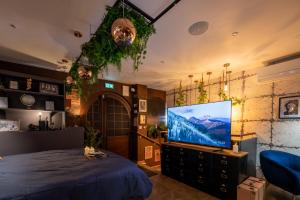 Villas Suite Prohibition - Love & atypique room sauna & spa : photos des chambres